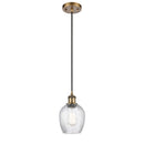 Salina Mini Pendant shown in the Brushed Brass finish with a Clear Spiral Fluted shade