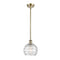 Deco Swirl Mini Pendant shown in the Antique Brass finish with a Clear shade