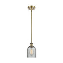 Caledonia Mini Pendant shown in the Antique Brass finish with a Charcoal shade