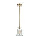 Hanover Mini Pendant shown in the Antique Brass finish with a Mouchette shade