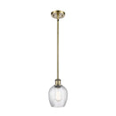 Salina Mini Pendant shown in the Antique Brass finish with a Clear Spiral Fluted shade