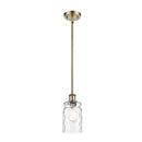 Candor Mini Pendant shown in the Antique Brass finish with a Clear Waterglass shade