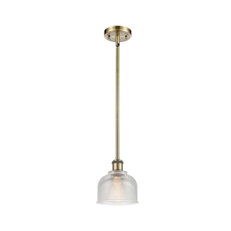 Dayton Mini Pendant shown in the Antique Brass finish with a Clear shade