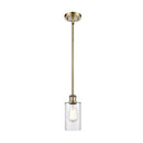 Clymer Mini Pendant shown in the Antique Brass finish with a Clear shade