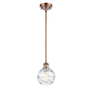 Deco Swirl Mini Pendant shown in the Antique Copper finish with a Clear shade