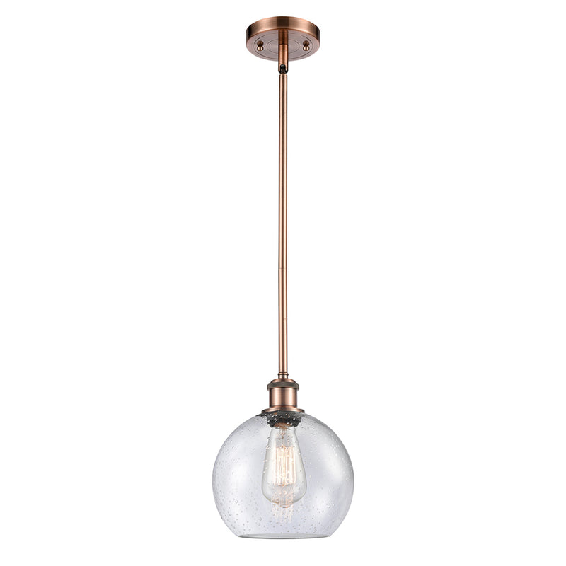 Athens Mini Pendant shown in the Antique Copper finish with a Seedy shade