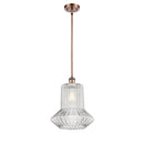 Springwater Mini Pendant shown in the Antique Copper finish with a Clear Spiral Fluted shade