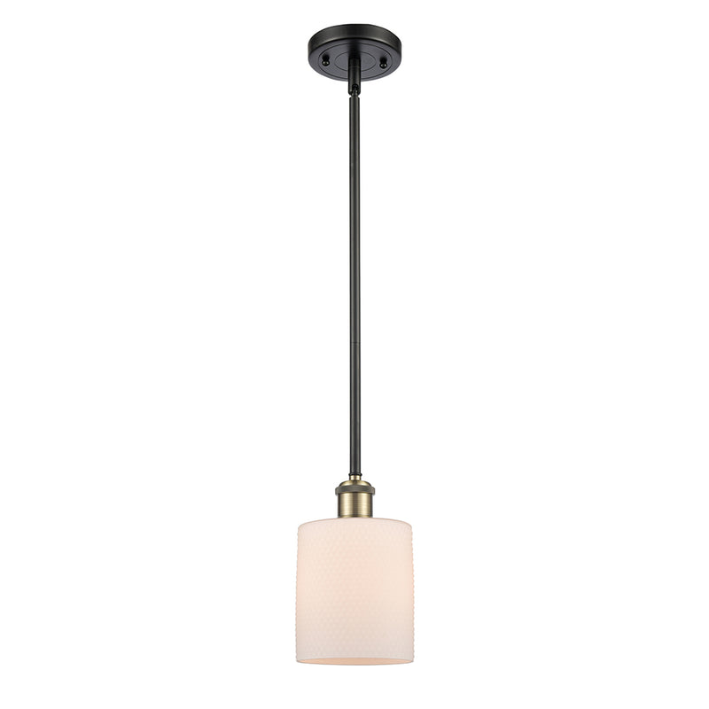 Cobbleskill Mini Pendant shown in the Black Antique Brass finish with a Matte White shade