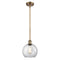 Athens Mini Pendant shown in the Brushed Brass finish with a Clear shade