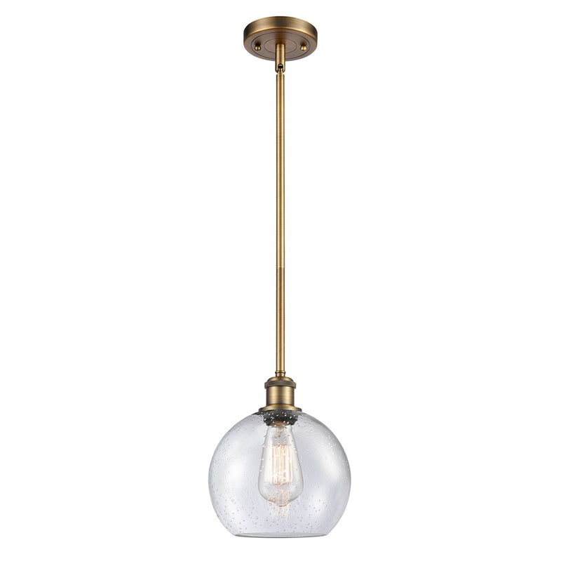 Athens Mini Pendant shown in the Brushed Brass finish with a Seedy shade