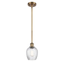 Salina Mini Pendant shown in the Brushed Brass finish with a Clear Spiral Fluted shade