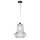 Springwater Mini Pendant shown in the Matte Black finish with a Clear Spiral Fluted shade