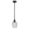 Salina Mini Pendant shown in the Matte Black finish with a Clear Spiral Fluted shade