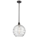 Deco Swirl Mini Pendant shown in the Oil Rubbed Bronze finish with a Clear shade