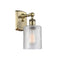 Cobbleskill Sconce shown in the Antique Brass finish with a Clear shade