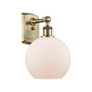 Athens Sconce shown in the Antique Brass finish with a Matte White shade