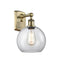 Athens Sconce shown in the Antique Brass finish with a Clear shade