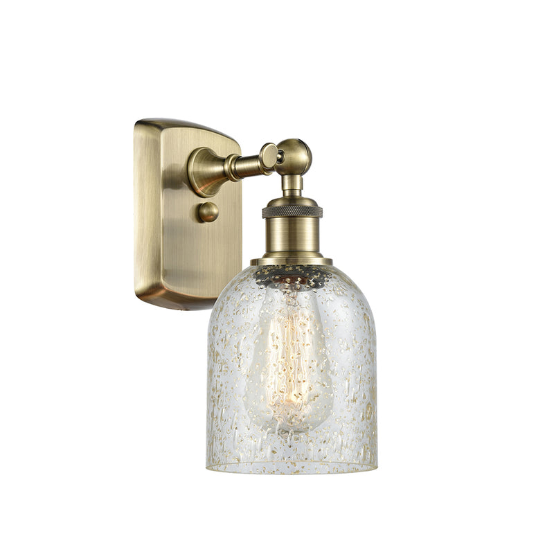 Caledonia Sconce shown in the Antique Brass finish with a Mica shade