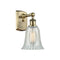 Hanover Sconce shown in the Antique Brass finish with a Mouchette shade