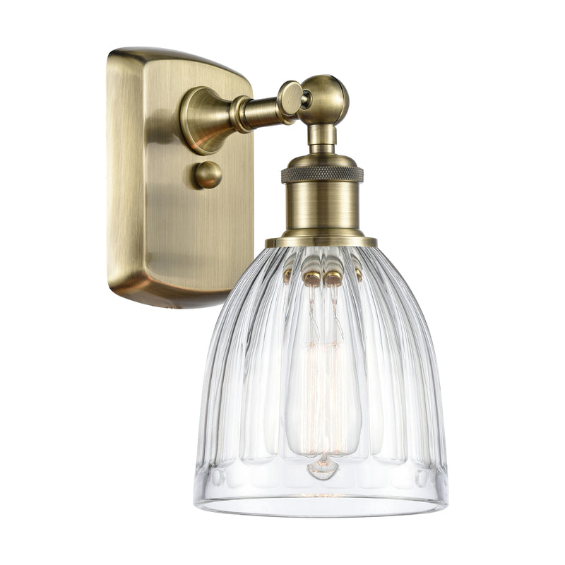 Brookfield Sconce shown in the Antique Brass finish with a Clear shade