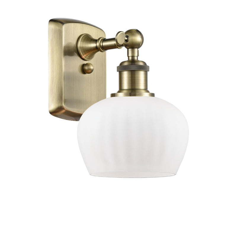 Fenton Sconce shown in the Antique Brass finish with a Matte White shade