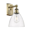 Ballston Dome Sconce shown in the Antique Brass finish with a Clear shade