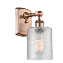 Cobbleskill Sconce shown in the Antique Copper finish with a Clear shade