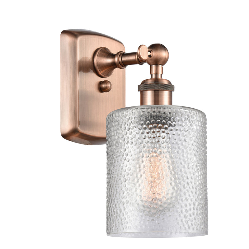 Cobbleskill Sconce shown in the Antique Copper finish with a Clear shade