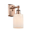 Hadley Sconce shown in the Antique Copper finish with a Matte White shade