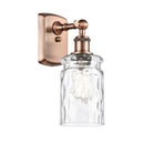 Candor Sconce shown in the Antique Copper finish with a Clear Waterglass shade