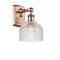 Dayton Sconce shown in the Antique Copper finish with a Clear shade