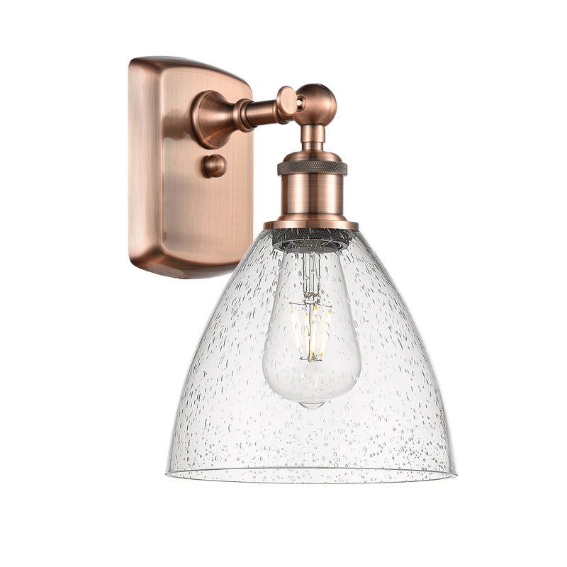 Ballston Dome Sconce shown in the Antique Copper finish with a Seedy shade