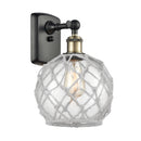 Farmhouse Rope Sconce shown in the Black Antique Brass finish with a Clear Glass with White Rope shade