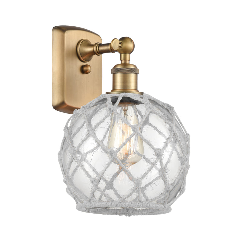 Farmhouse Rope Sconce shown in the Brushed Brass finish with a Clear Glass with White Rope shade