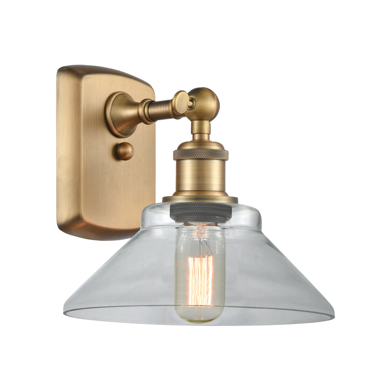 Orwell Sconce shown in the Brushed Brass finish with a Clear shade