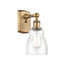 Ellery Sconce shown in the Brushed Brass finish with a Seedy shade