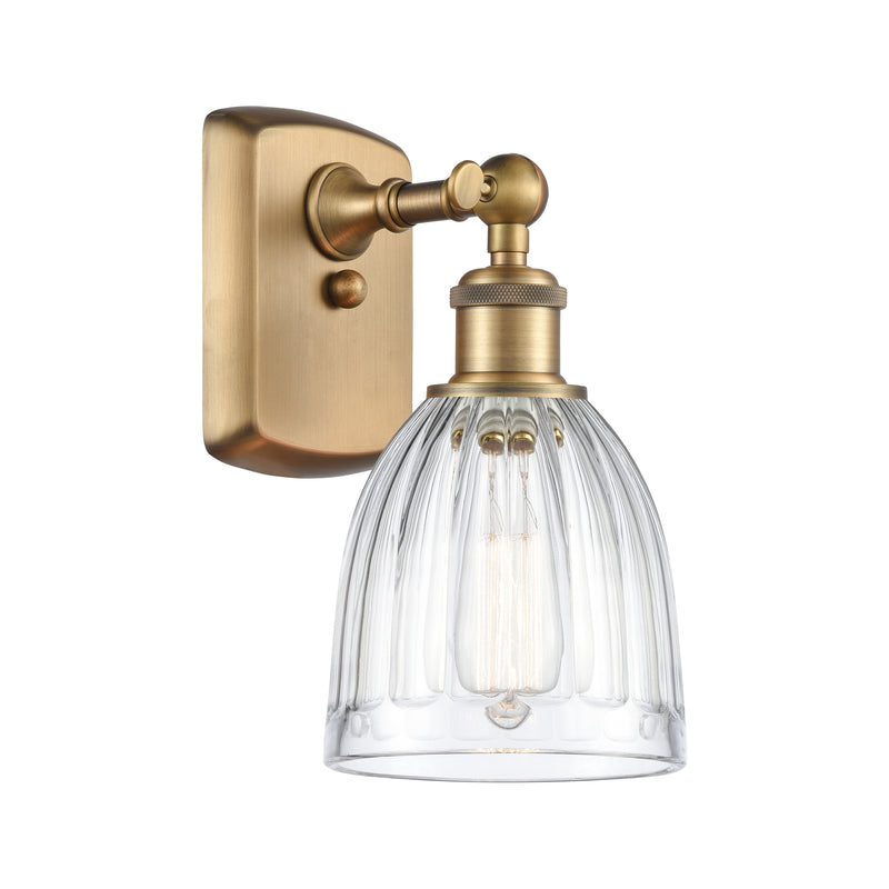 Brookfield Sconce shown in the Brushed Brass finish with a Clear shade