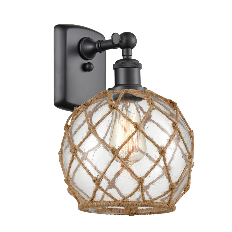 Farmhouse Rope Sconce shown in the Matte Black finish with a Clear Glass with Brown Rope shade