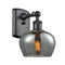 Fenton Sconce shown in the Matte Black finish with a Plated Smoke shade