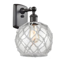 Farmhouse Rope Sconce shown in the Oil Rubbed Bronze finish with a Clear Glass with White Rope shade