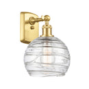 Deco Swirl Sconce shown in the Satin Gold finish with a Clear shade