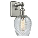 Salina Sconce shown in the Brushed Satin Nickel finish with a Clear Spiral Fluted shade