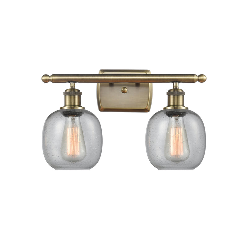 Belfast Bath Vanity Light shown in the Antique Brass finish with a Seedy shade