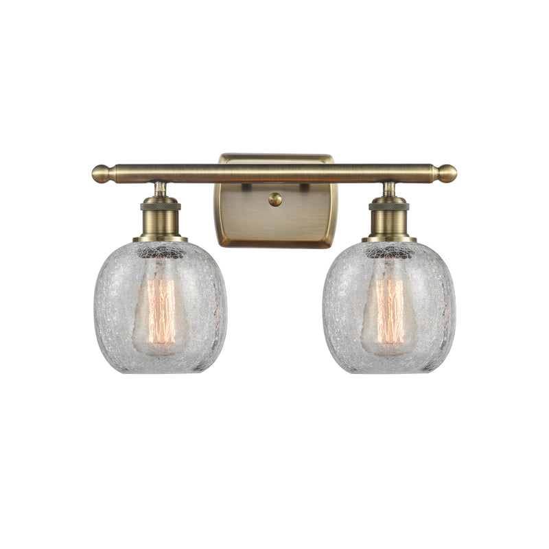 Belfast Bath Vanity Light shown in the Antique Brass finish with a Clear Crackle shade