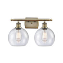 Athens Bath Vanity Light shown in the Antique Brass finish with a Seedy shade