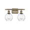 Waverly Bath Vanity Light shown in the Antique Brass finish with a Clear shade