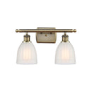 Brookfield Bath Vanity Light shown in the Antique Brass finish with a White shade