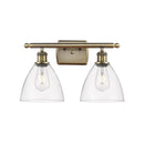 Ballston Dome Bath Vanity Light shown in the Antique Brass finish with a Clear shade