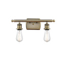 Bare Bulb Bath Vanity Light shown in the Antique Brass finish