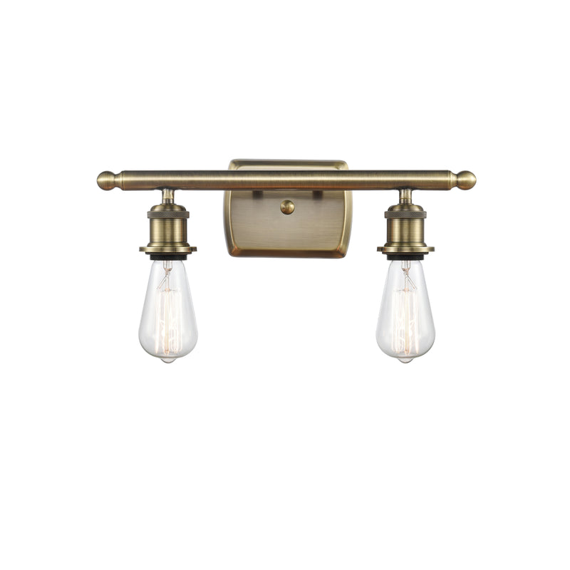 Bare Bulb Bath Vanity Light shown in the Antique Brass finish